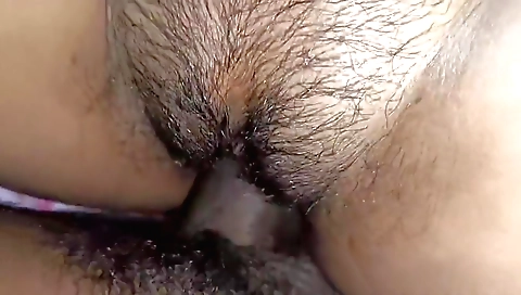 Young teen takes a dildo and fucks her hairy pussy