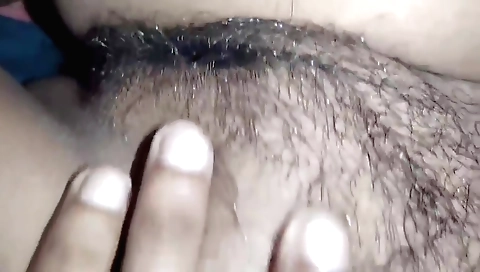 Busty brunette makes her hairy pussy as much as she can