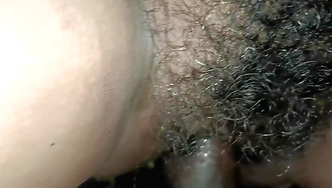 Indian hairy girl fucks her shaved pussy in shower