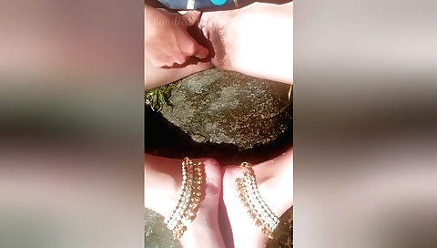 Horny solo girl is masturbating in spring fountain