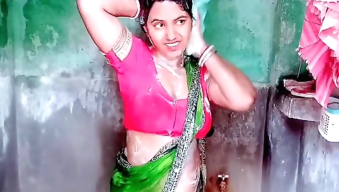 Indian girl is playing outdoors and taking off her clothes