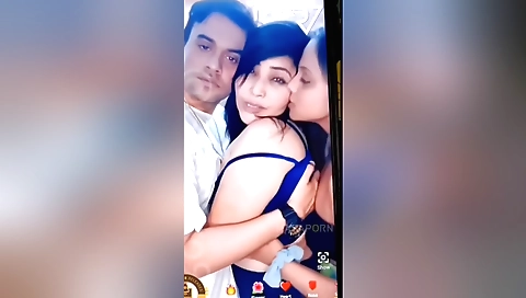 I am in a threesome on a webcam with a busty blonde and two guys