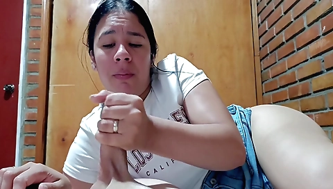 Hot little babe in a white blouse sucks my finger on her legs