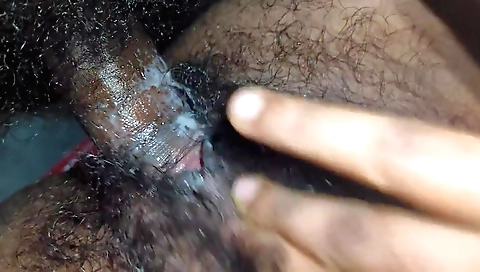 Hairy girl moans with pleasure as she likes the man's hard cock