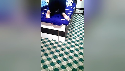 Busty amateur video of a girl masturbating in the living room