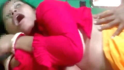 Indian brunette with big tits showing off her body