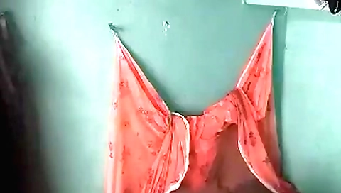 Amateur teen girl shows her tits and pussy in a hidden cam