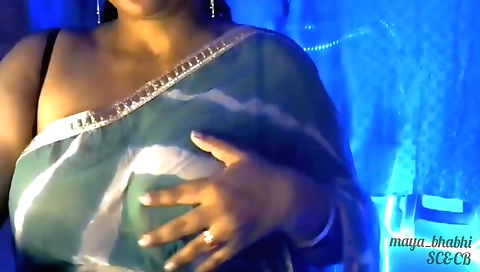 Busty brunette with big natural tits spreads pussy
