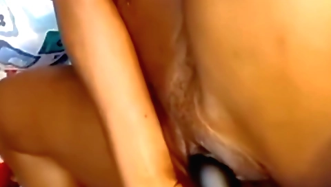 Indian sexy slut with a sexy head rides a huge dildo