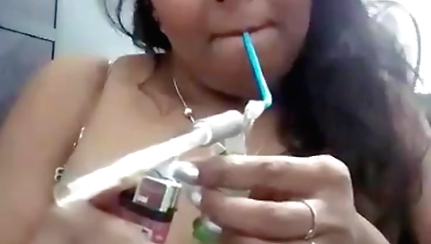 Hot brunette amateur indian chick enjoying a hookah