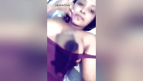 Busty brunette showing her big boobs on the webcam