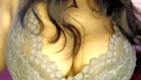 Solo female with big tits is doing self sex in bed