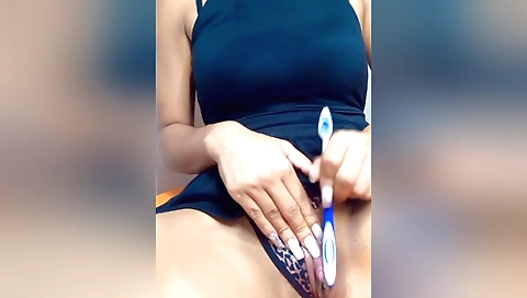 Amateur video of a female enjoying masturbation toys