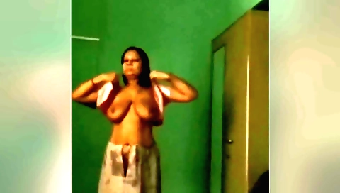 Gorgeous brunette enjoys taking a solo webcam clip
